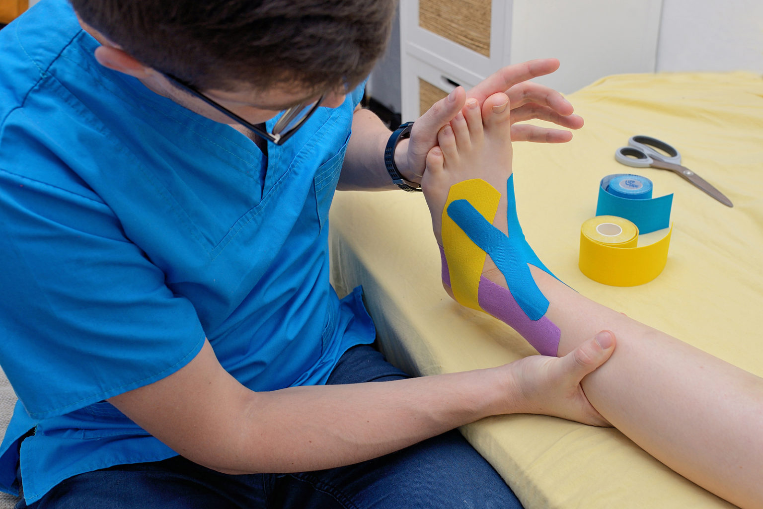 Kinesiology Taping for Ankle Sprains - Seattle Clinical Massage School